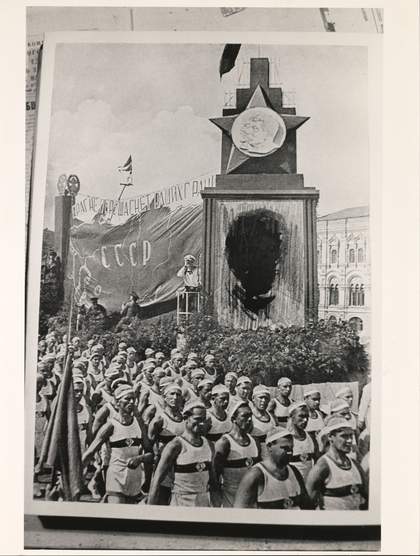 Celebratory procession featuring a portrait of N. Yezhov, head of NKVD in 1936-38 c. 1936-38. Tate Library and Archive